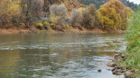 Looking downstream Colorado River head of Glenwood Canyon autumn leaves Stock Footage 57658086
