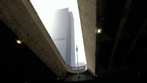  looking up drone moving shot of Los Angeles city modern skyscraper high-rises  Stock Footage 99116118