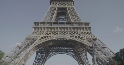 Looking up at The Eiffel Tower (Tour Eiffel) / Paris, France - 4K Stock Footage 69727942