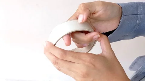 Looking for an end of a double tape Stock Footage 145562123