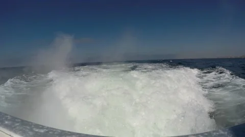 Looking at engine wash with exhaust of motor yacht under way Newport Beach  Video stock 67573583