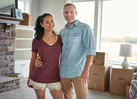 Looking forward to settling in. a young couple moving into their new home. Foto stock