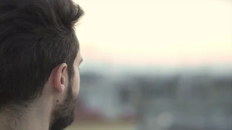 Looking at the Future, Attractive Young Man On Rooftop of a building,Slow Mot Stock Footage 106727795