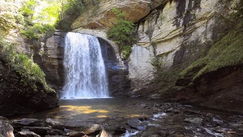 Looking glass falls in slow motion Stock Footage 77170708