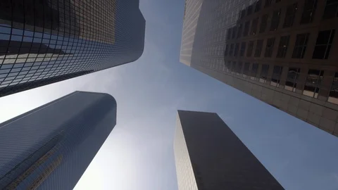 Looking up glide shot view of modern business skyscrapers in Los Angeles city US Stock Footage 99116340