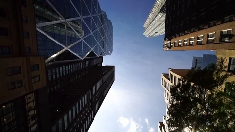  Looking up glide shot view of modern business skyscrapers in NYC New York City  Stock Footage 117070488