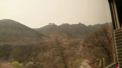 Looking at the great wall from a train window Видео 53506340