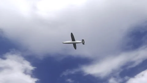 Looking Up at Hornet Kamikaze Fixed Wing AI-Assisted Drone Flying in Blue Sky 스톡 동영상 342308311