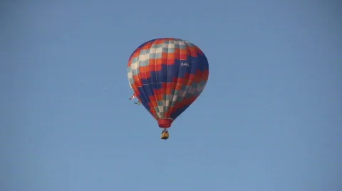 Looking Up At A Hot Air Balloon Flying Stock Footage
