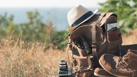 Looking image of travelling concept, essential vacation items. Stockbeeldmateriaal 94573892