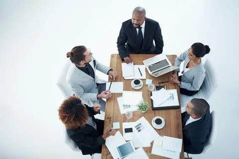 Looking for innovative ideas to solve the problem. High angle shot of a group of Stock Photos