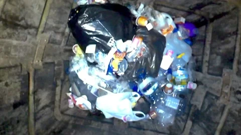 Looking inside a Plastic Recycle And Waste Management Container Stock Footage 222597673