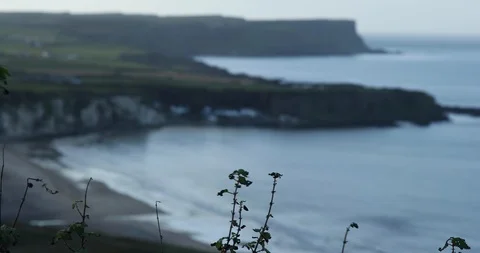 Looking to Irish Coast from the hill in a cold day Stock Footage 101024923