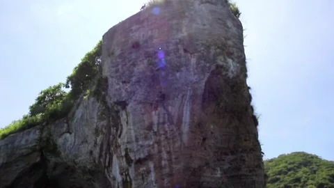 Looking up an island, PAN down Stock Footage 81148578