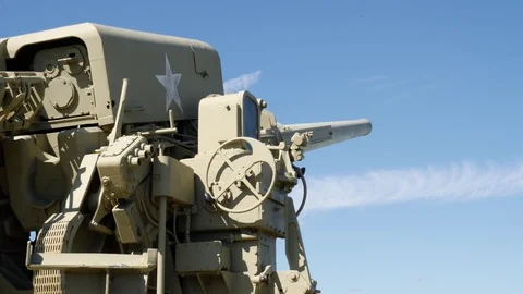 Looking long the barrel of a gun on a tank Stock Footage 85380477