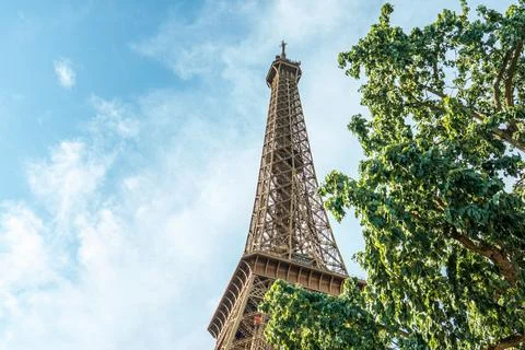 Looking up from low angle at the Eiffel Tower, Paris in Summer Photos