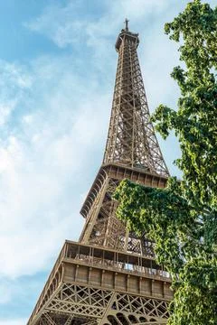 Looking up from low angle at the Eiffel Tower, Paris in Summer Photos