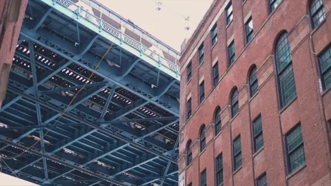 Looking Up at the Manhattan Bridge from Dumbo Stock Footage 301648876