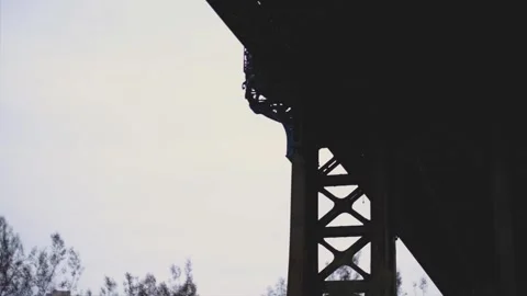 Looking Up at the Manhattan Bridge Silhouette Stock Footage 301648890