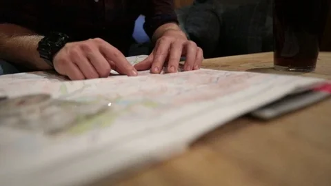 Looking at a Map Video stock 90861888