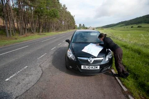 Looking up on a map in the road side inverness scotland europ Stock Photos