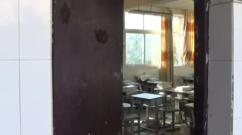 Looking into the messy empty classroom through the door in a high school Stock Footage 45191538