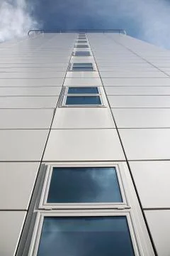 Looking up at a modern building Stock Photos