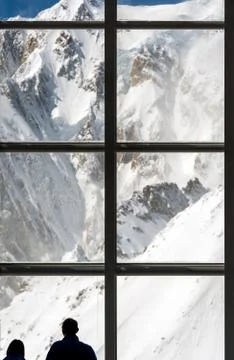 Looking at mountains through a huge window Stock Photos