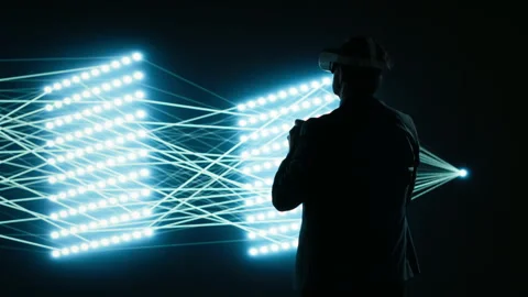 Looking at neural network, VR headset gear and engineer Stock Footage 329721075