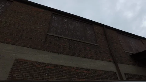 Looking Up at Old Abandoned Brick Building Stock Footage 101174544