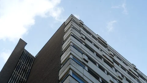 Looking up an old and run down corner of office building Stock Footage 115051244