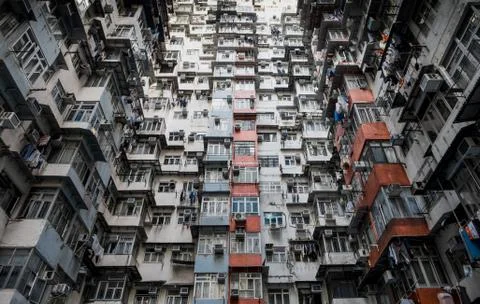 Looking up at old building to sky in perspective view, Dramatic tone. Stock Photos