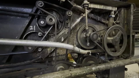 Looking into old machine, gears and belts visible Video stock 165810909
