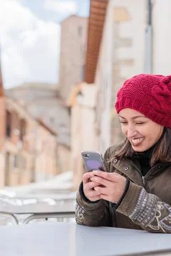 Looking online menu on restaurant app. Latin Honduran doing Local tourism in Stock Photos