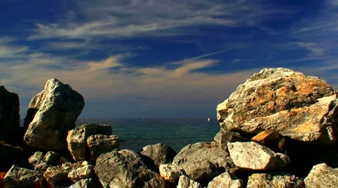 Looking at the open sea through a gap in rocks 1 Stock Footage 947981
