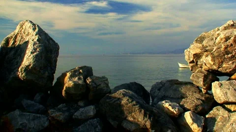 Looking at the open sea through a gap in rocks 4 Stock Footage 948058