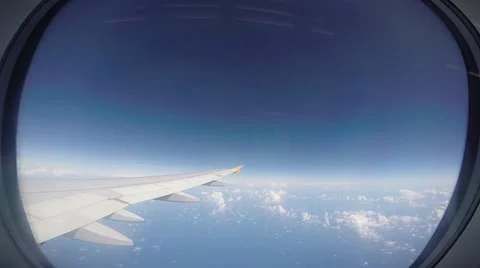 Looking Out of an Airplane Window on the engine and wing Stock Footage 47197918