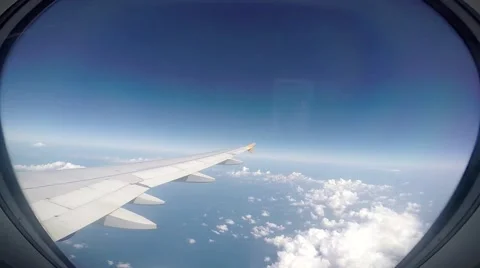 Looking Out of an Airplane Window on the engine and wing Stock Footage 48552900