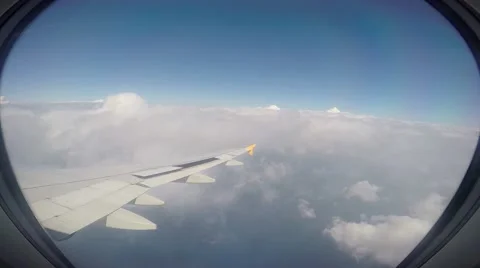Looking Out of an Airplane Window on the engine and wing Stock Footage 49725216