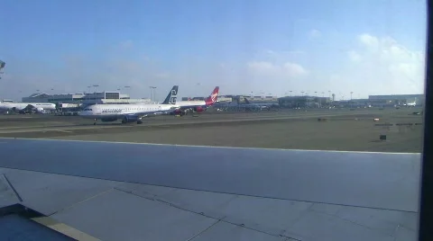 Looking out airplane window at LAX Stock Footage 113571
