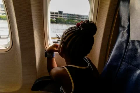 Looking out of the airplane window Stock Photos
