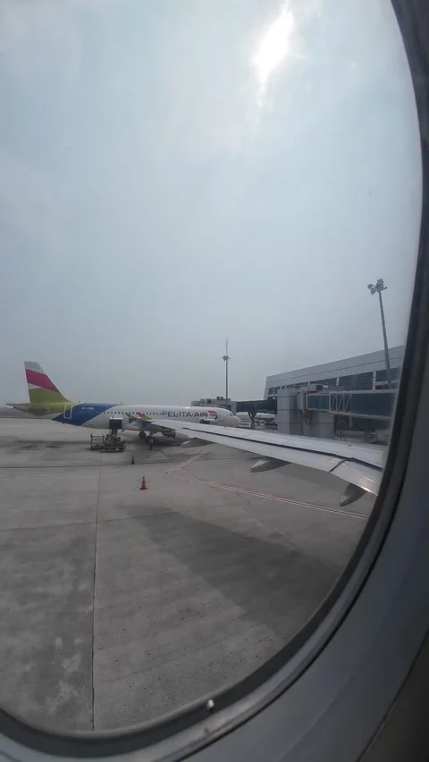 Looking Out the Airplane Window, A plane and cloudy weather Stock Footage 276966358