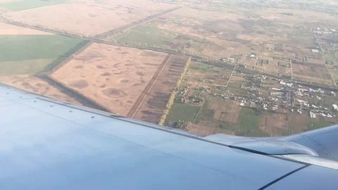 Looking out from airplane window, view from above. Stock Footage