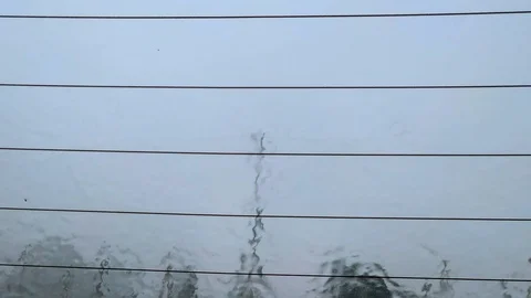 Looking out of the back window of a car with lines across the glass, Stock Footage 117715381