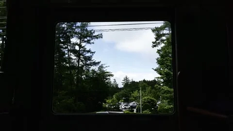 Looking Out the Bus Window: Blue Sky, White Clouds and Shady Green Trees Stock Footage 319809262