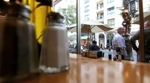 LOOKING OUT THE CAFE WINDOW Stock Footage 9310274