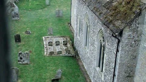 Looking out a castle window over a graveyard. 動画素材 5667820