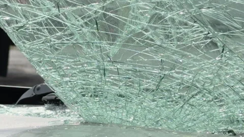 Looking out front window of busted windshield 4k Stock Footage 332955745