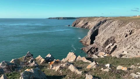Looking out from Giltar Point towards Lydestep Headland Stock Footage 235929079