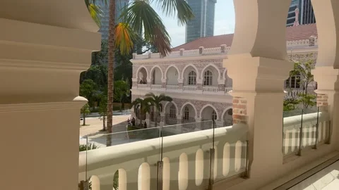 Looking out from a high-rise balcony corridor in Kuala Lumpur, Malaysia Stock Footage 345456058